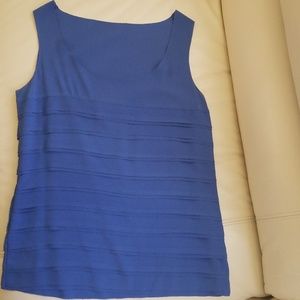 Silk blue layered raw cut sleeveless blouse